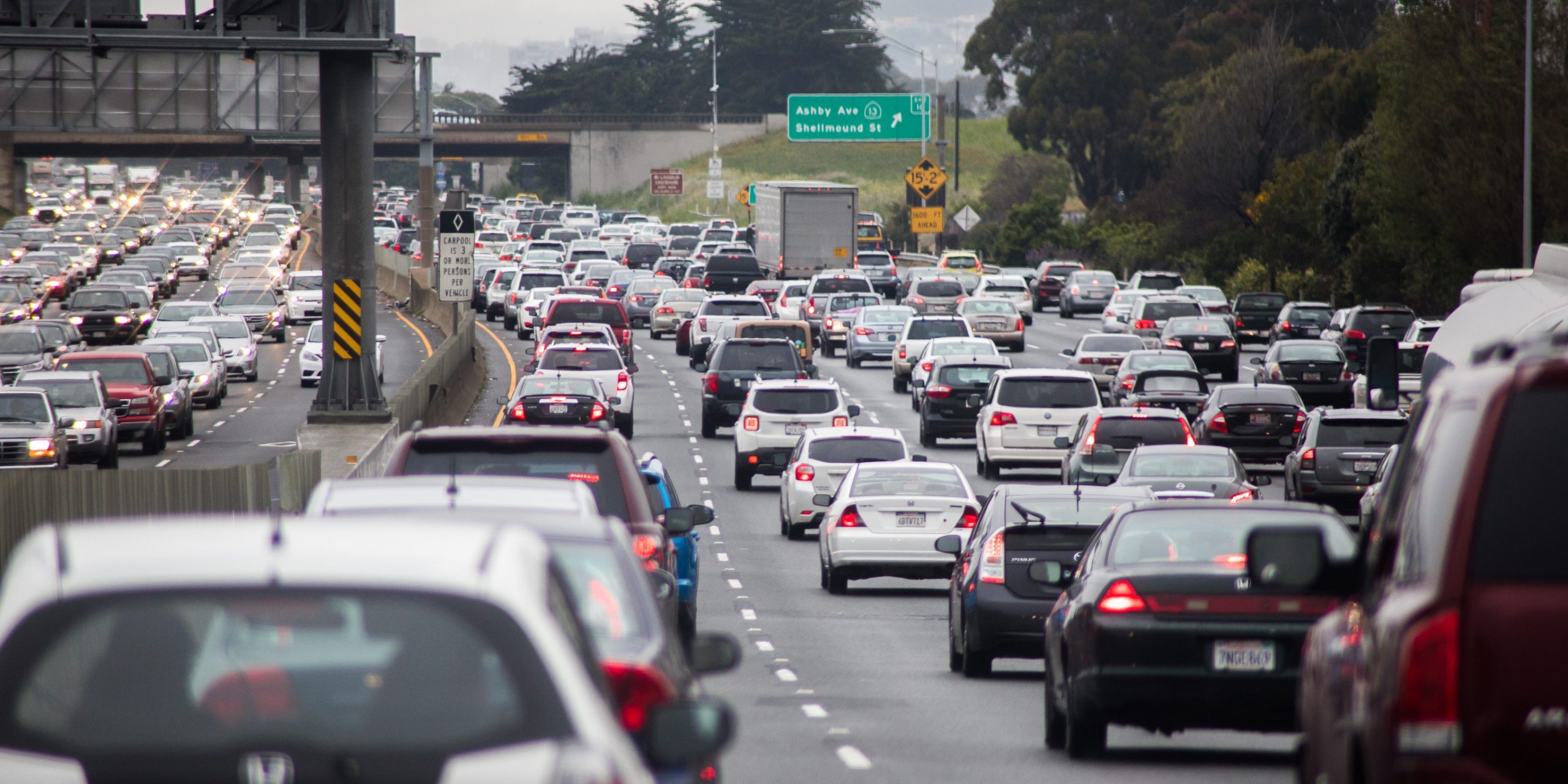 Cars driving in heavy traffic.